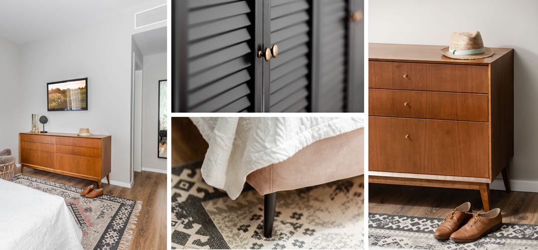 עיצוב אקלקטי בחדר השינה- שטיח פרנזים בוהו, שידת עץ בסגנון וינטאג' וארון תריס שחור.